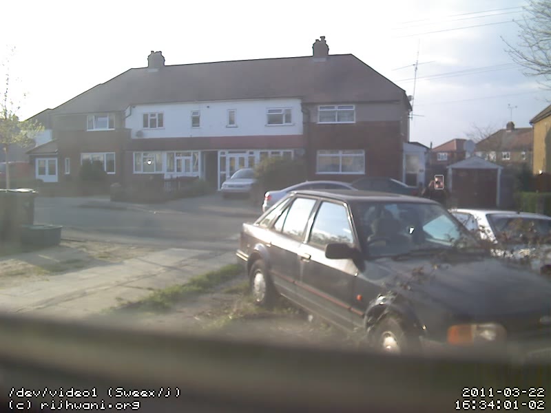 Unidentified individual photographing the house 2006-01-17 16:33:58